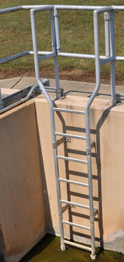 098 An aluminum fixed ladder at a wastewater treatment plant.