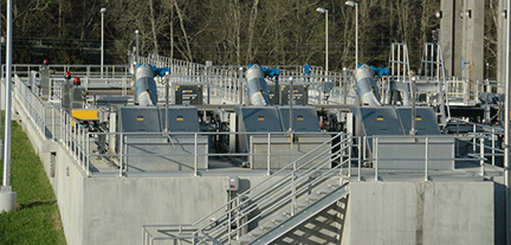 A water treatment plant with industrial aluminum handrails and stairs
