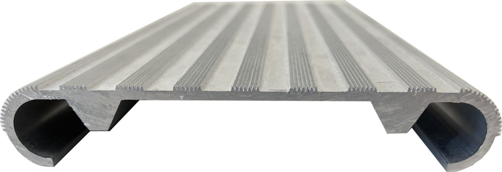 A closeup of an aluminum Ships Ladder tread.